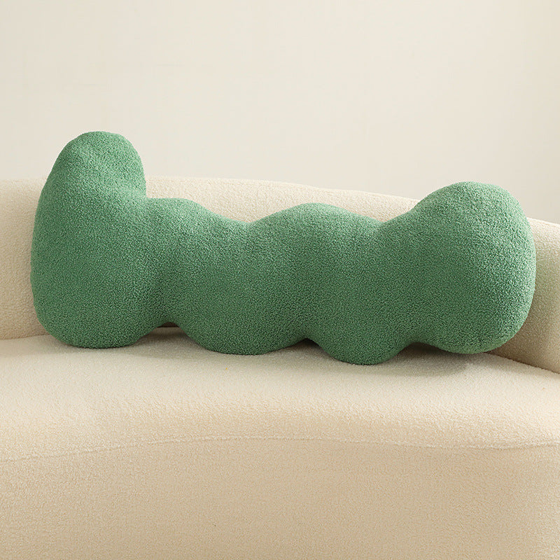 Fun cactus plush pillow, adds a vibrant, playful touch to any modern bedroom.