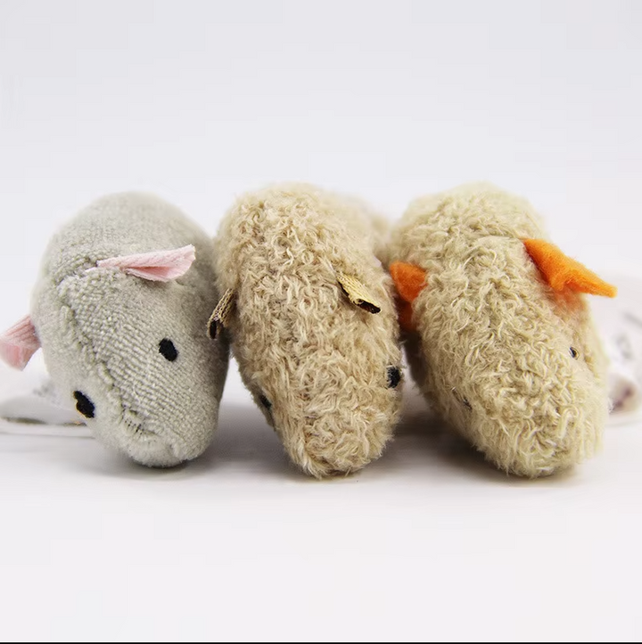 Premium cat toy pack featuring realistic plush mice, perfect for interactive play & engaging your kitty's instincts.