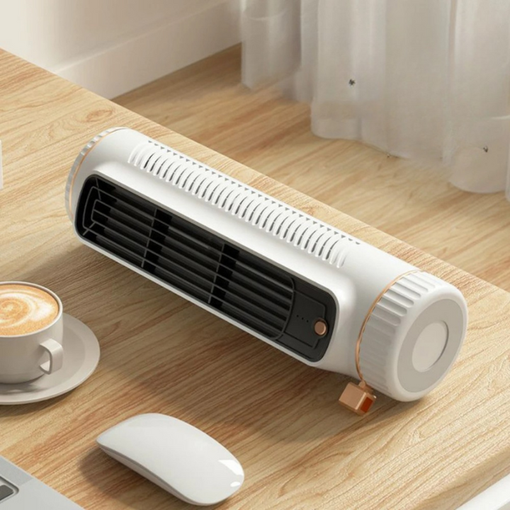 Portable bladeless tower fan for quiet cooling airflow in home or office. Compact USB personal fan.