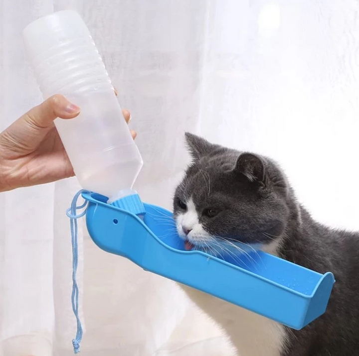 Portable dog water bottle with integrated bowl for easy pet hydration during travel & walks.