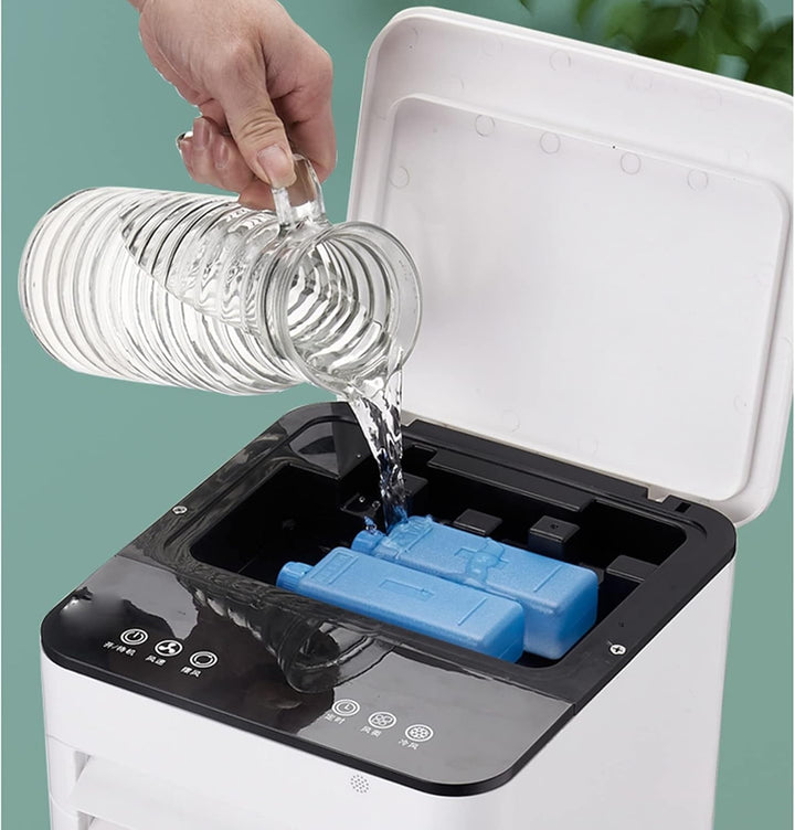 Compact portable air cooler and humidifier for personal space, featuring fan, cooling, and misting.