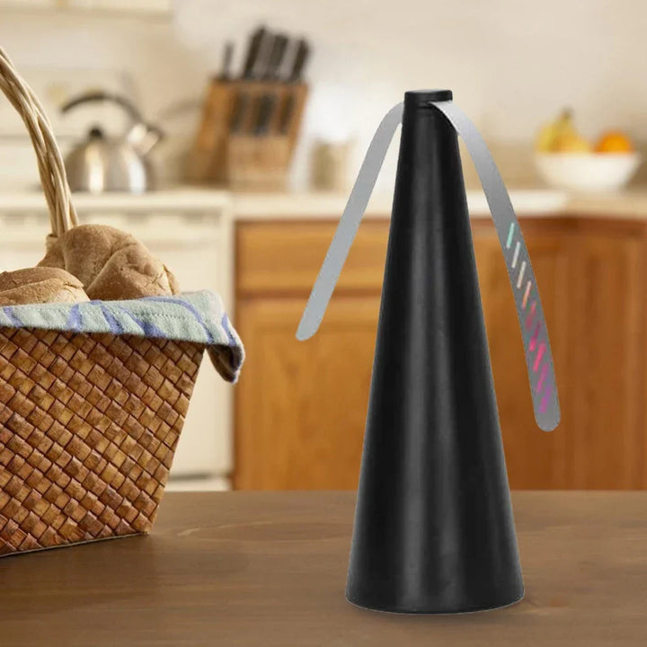 Portable fly repellent fan for outdoor dining, picnics, & BBQs, keeping food safe.