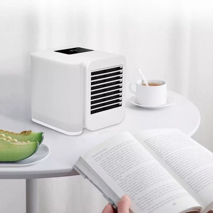 Close-up of a mini air cooler's controls, showcasing its humidifier function and easy adjustments.