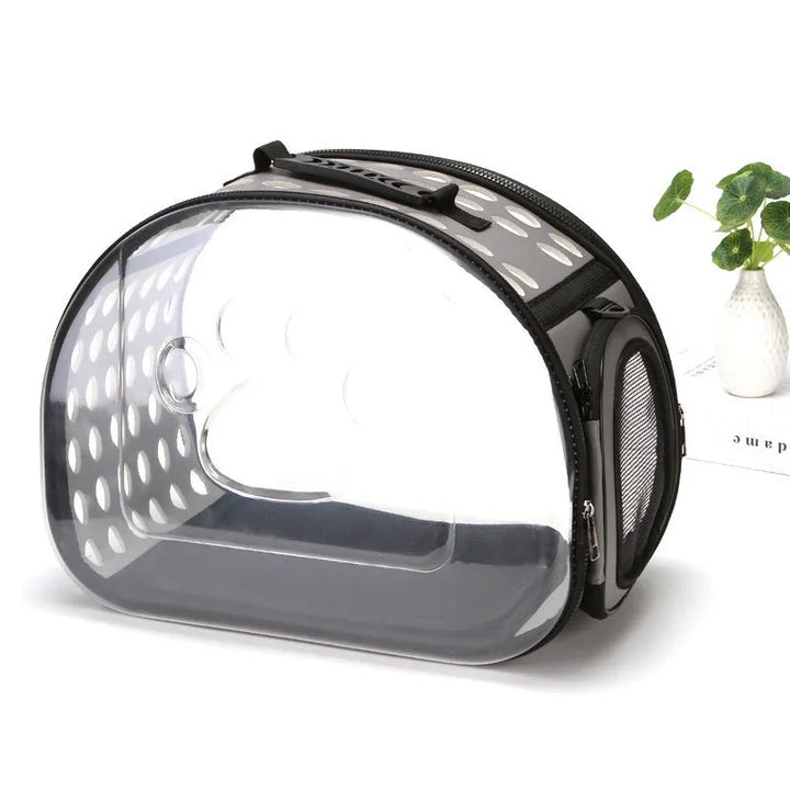 Durable pet carrier with viewing window, ensuring safe car travel & easy vet visits for your dog or cat.