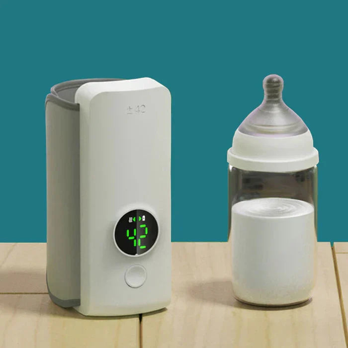 Portable rechargeable baby bottle warmer with digital display for on-the-go infant feeding.