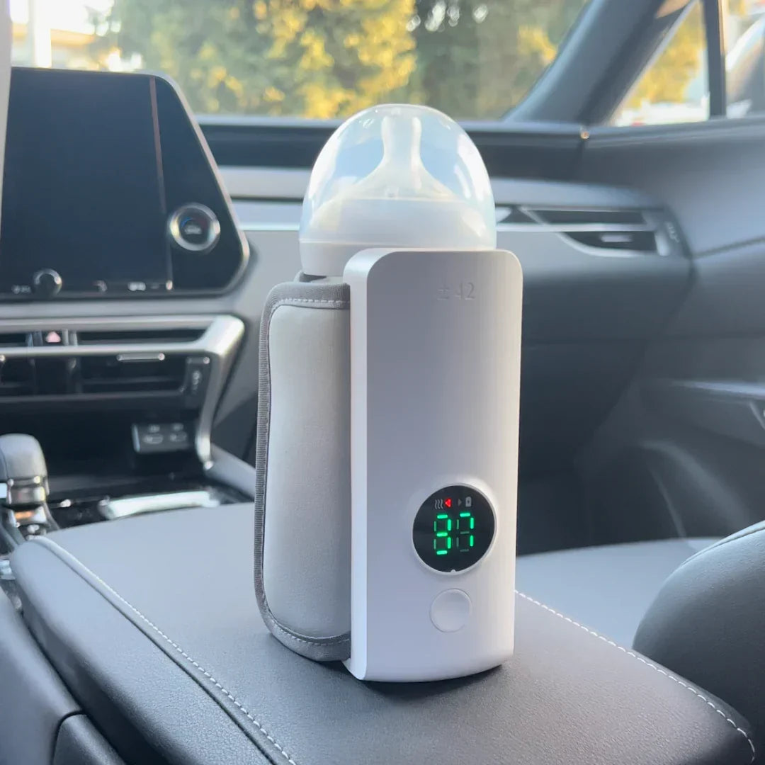 Parent essential: portable, rechargeable baby bottle warmer with digital display for easy feeding anywhere.