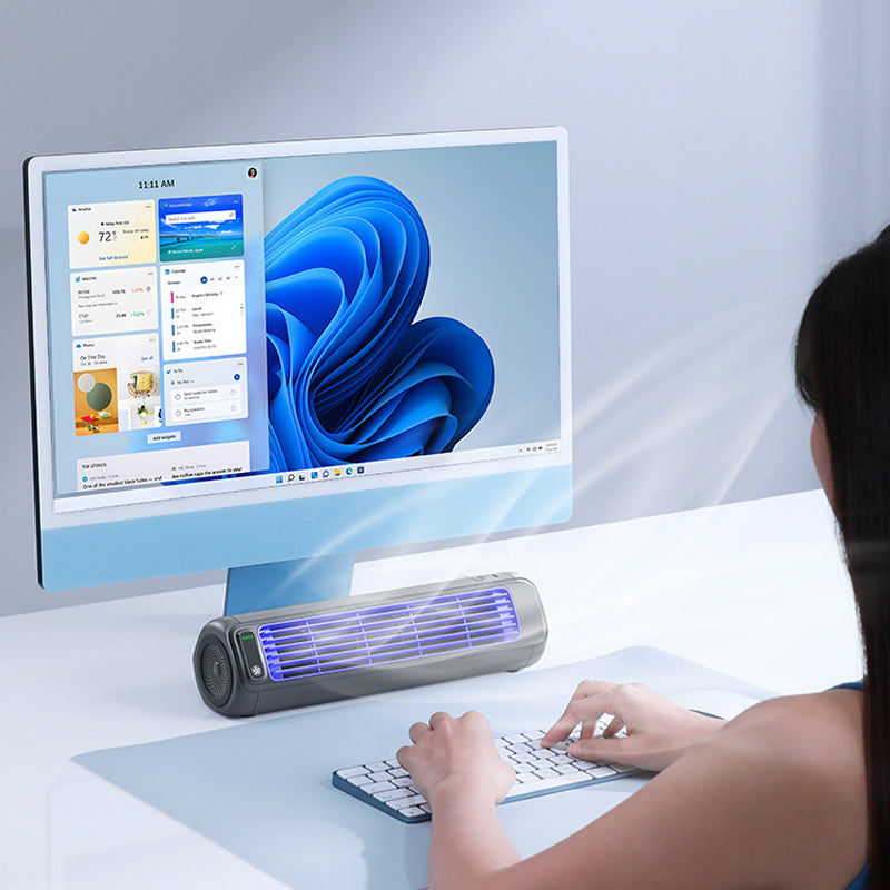 Compact mini personal air cooler, rechargeable fan for desks, bedrooms, or travel.