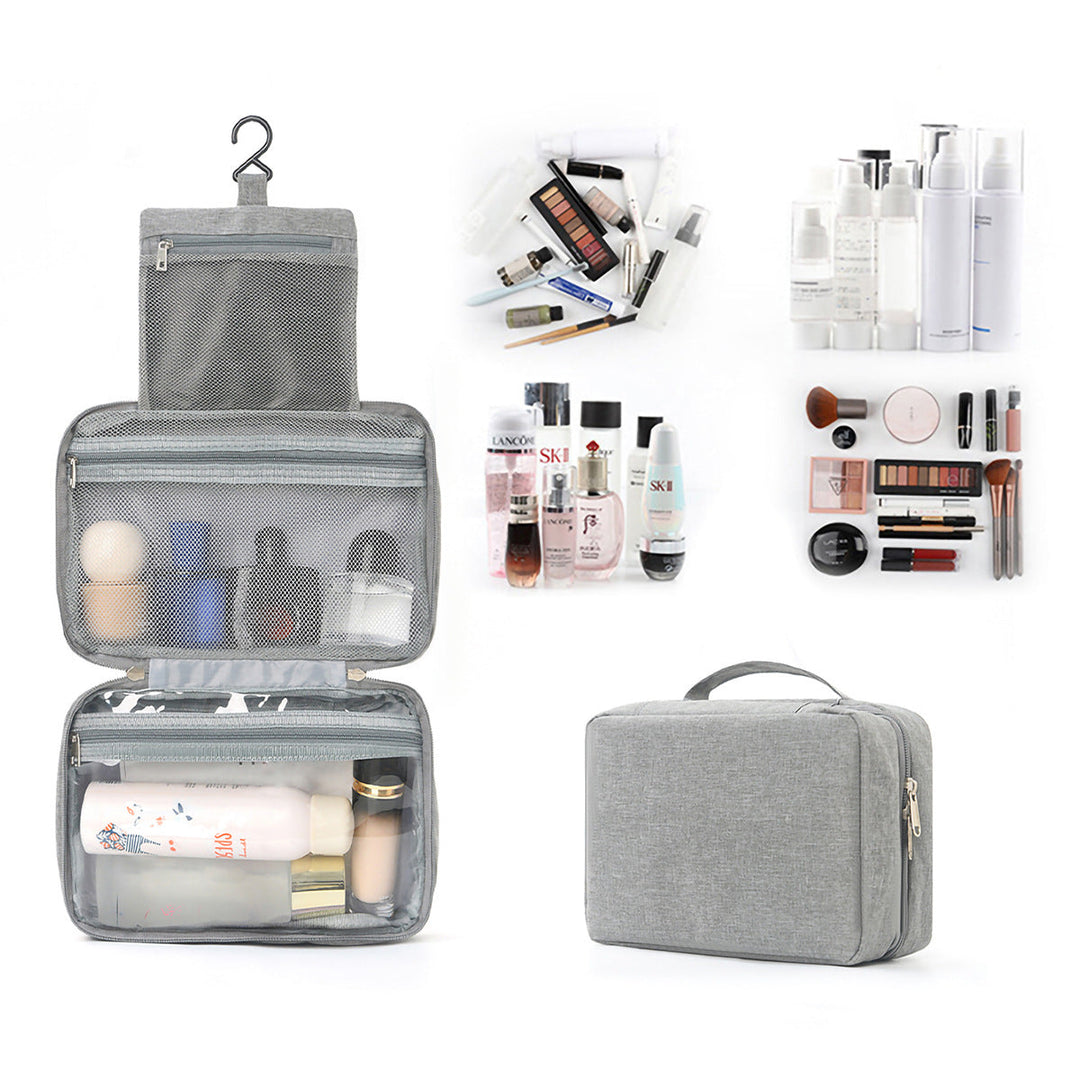 Portable travel toiletry bag with hook & multiple compartments for organized storage of bathroom essentials & cosmetics.