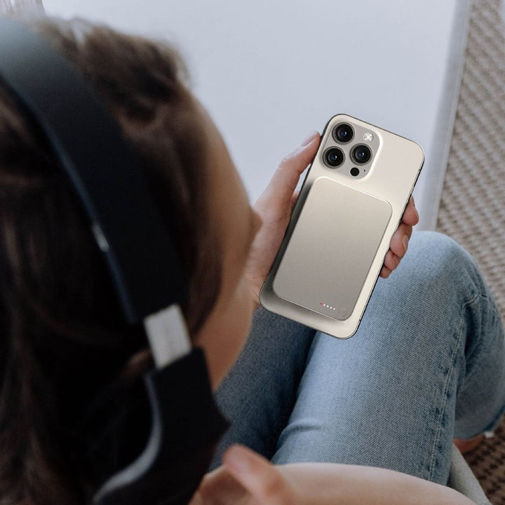 Travel-friendly wireless magnetic power bank, tech gadget for charging.