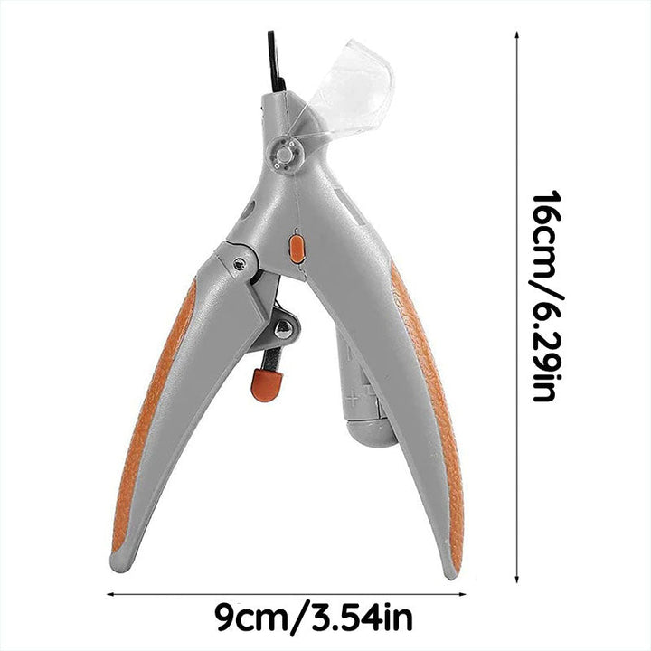 Hand holding precision dog nail clippers, demonstrating comfortable grip for safe pet paw grooming.