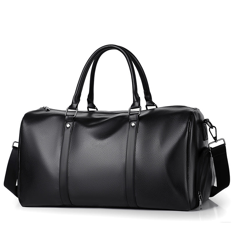 Elegant black leather men's travel duffle bag, a premium carry-on for the discerning traveler.