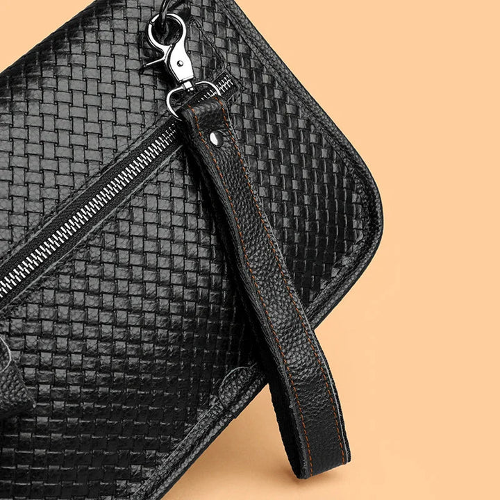 Versatile men's leather shoulder bag. Crossbody sling for easy access to travel essentials.