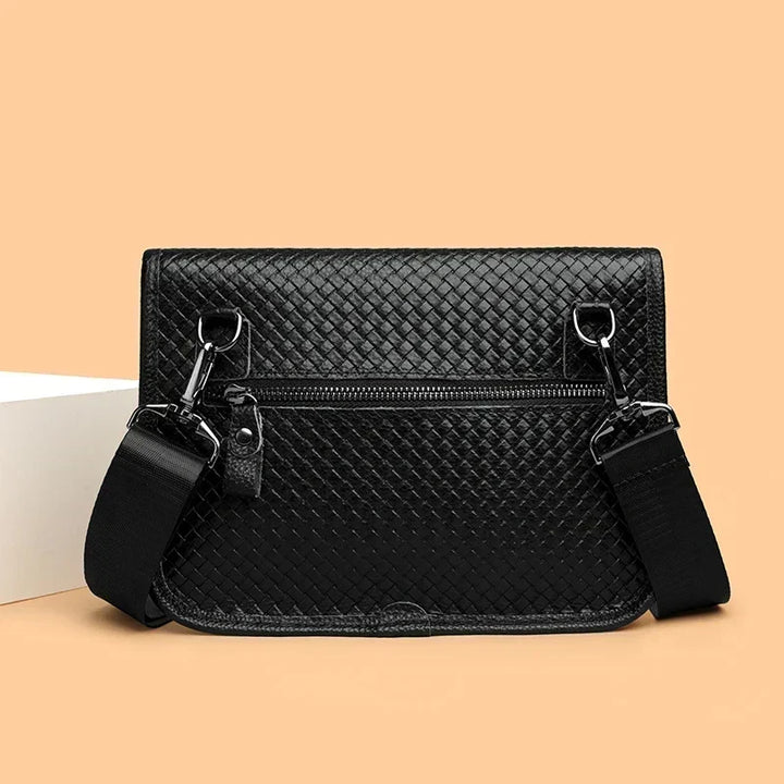 Genuine leather men's sling bag with adjustable strap. Durable & functional crossbody design.