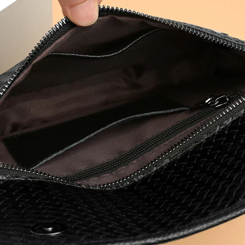 Men's compact travel bag. Genuine leather sling bag, ideal for securing essentials on the go.