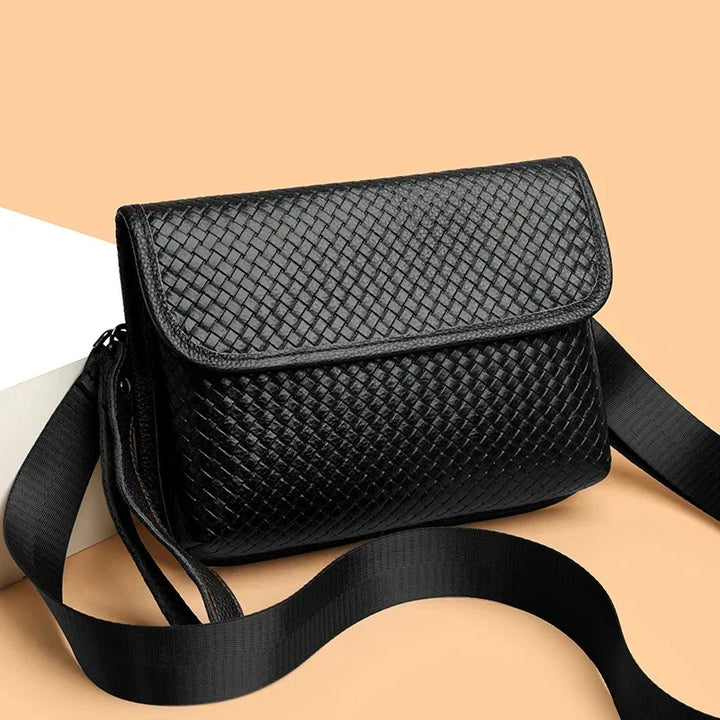 Back view: Men's leather shoulder bag with comfortable, adjustable strap for versatile wear.