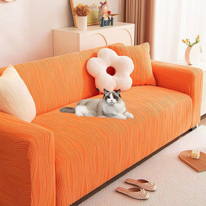 Premium jacquard couch protector, thick anti-scratch stretch slipcover for pet-friendly living.