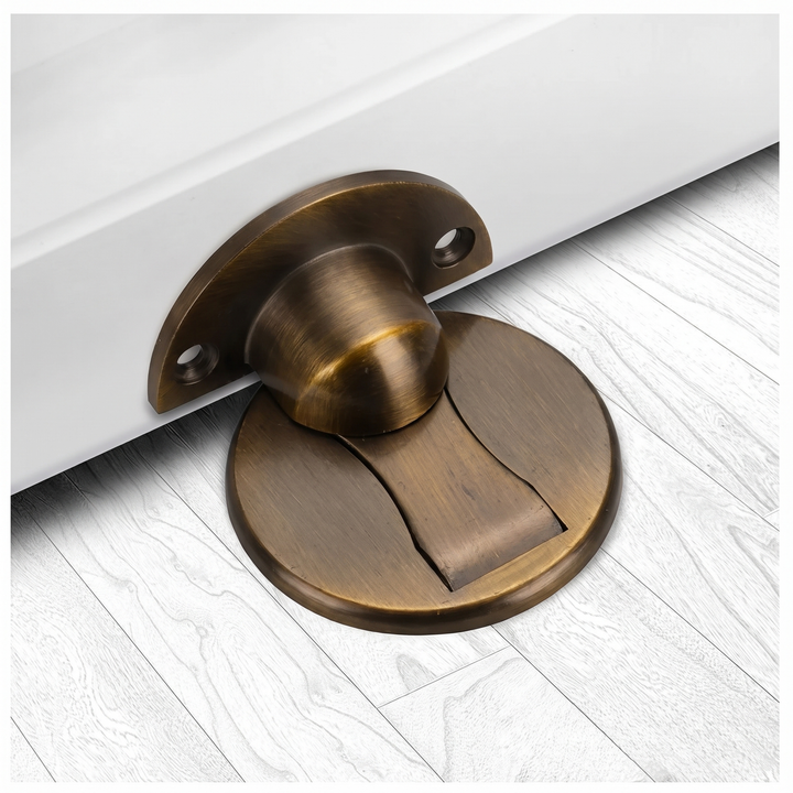 Sleek silver magnetic door catch keeps interior doors open. Ideal for home, office. Durable door hardware.
