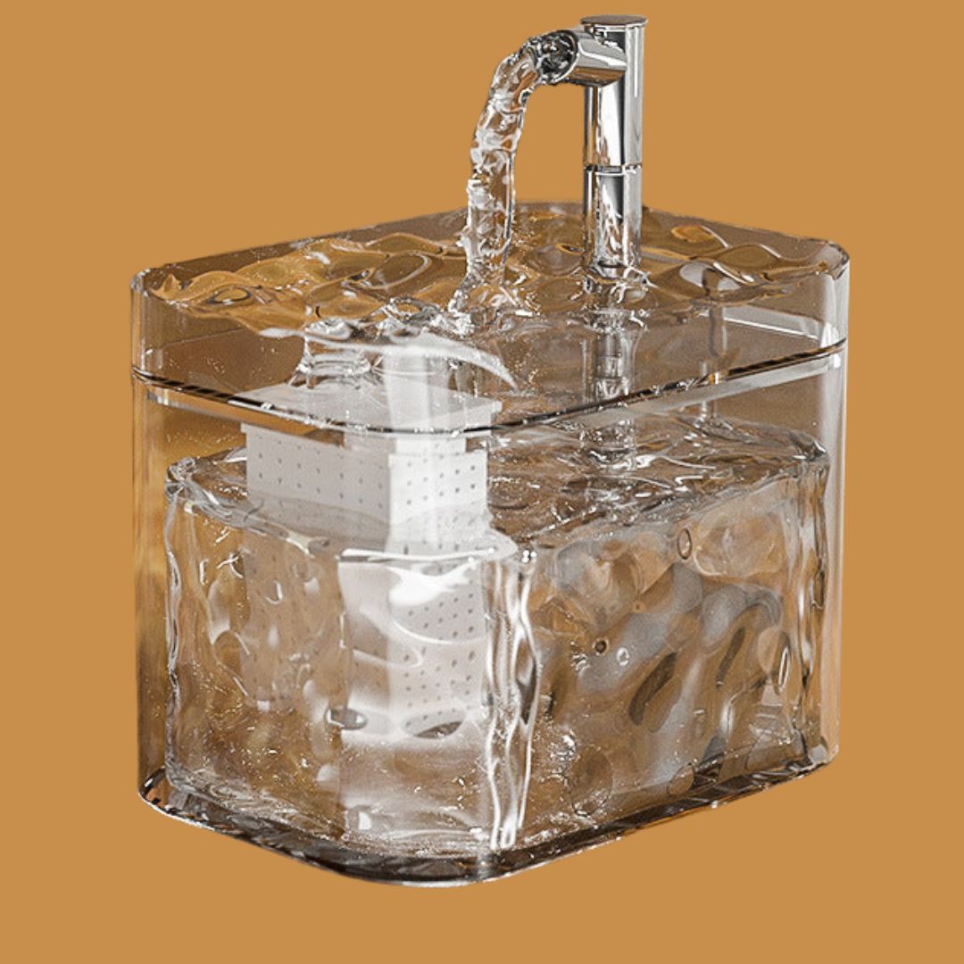 Dog enthusiastically drinking from the quiet pet fountain, a perfect water bowl alternative.