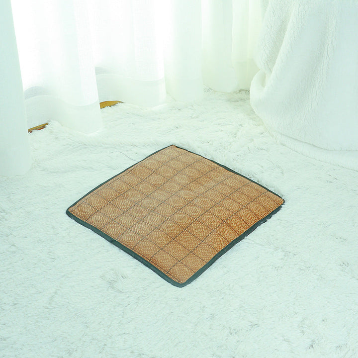 Indoor cat bed solution: natural rattan tent with a cooling mat for year-round use.