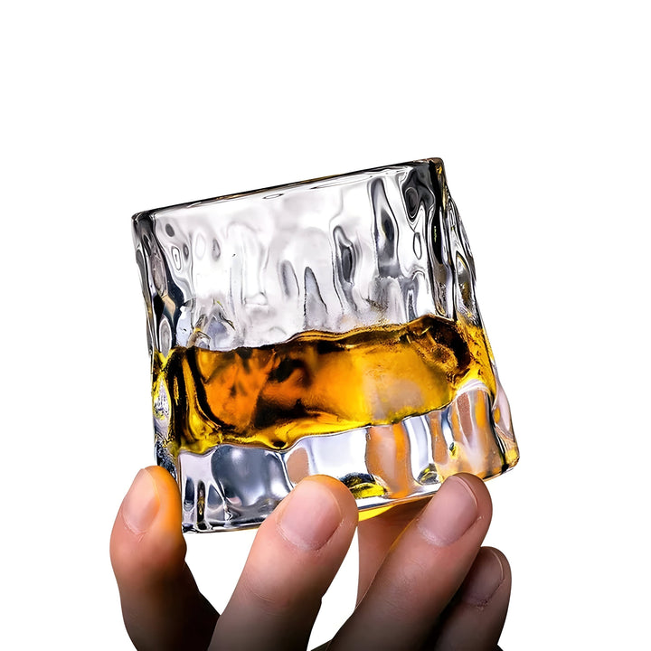 Premium rotating crystal tasting glass with modern design for whiskey & spirits. Enhance your home bar experience.