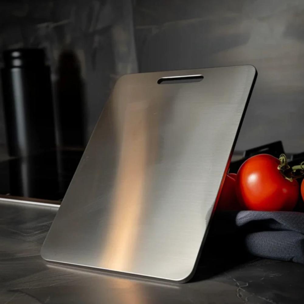 Premium stainless steel cutting board for hygienic kitchen food prep. Durable & dishwasher safe kitchenware.