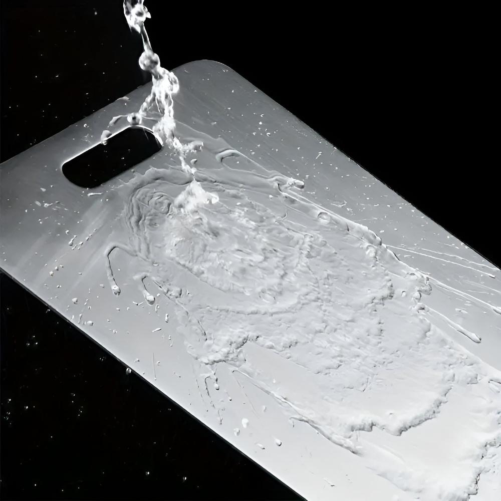 Hygienic stainless steel cutting board, perfect for kitchen food prep. Durable, non-slip, and easy to clean.