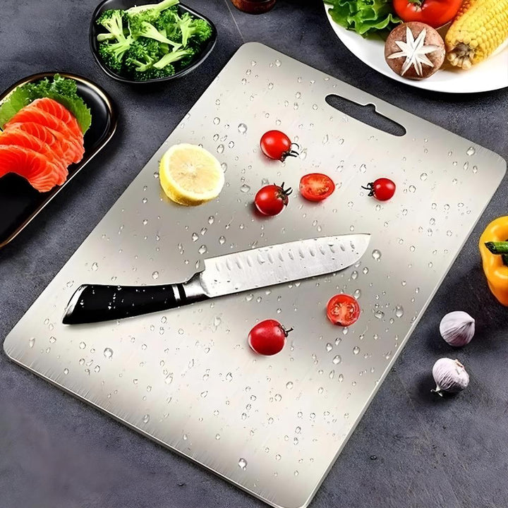 Sleek stainless steel cutting board for modern kitchen hygiene. Durable, dishwasher safe, and non-slip.