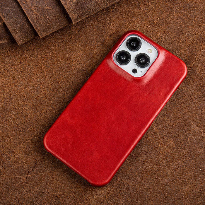 Secure your iPhone with this shock-absorbing leather case. Enhanced grip & wireless charging ready.