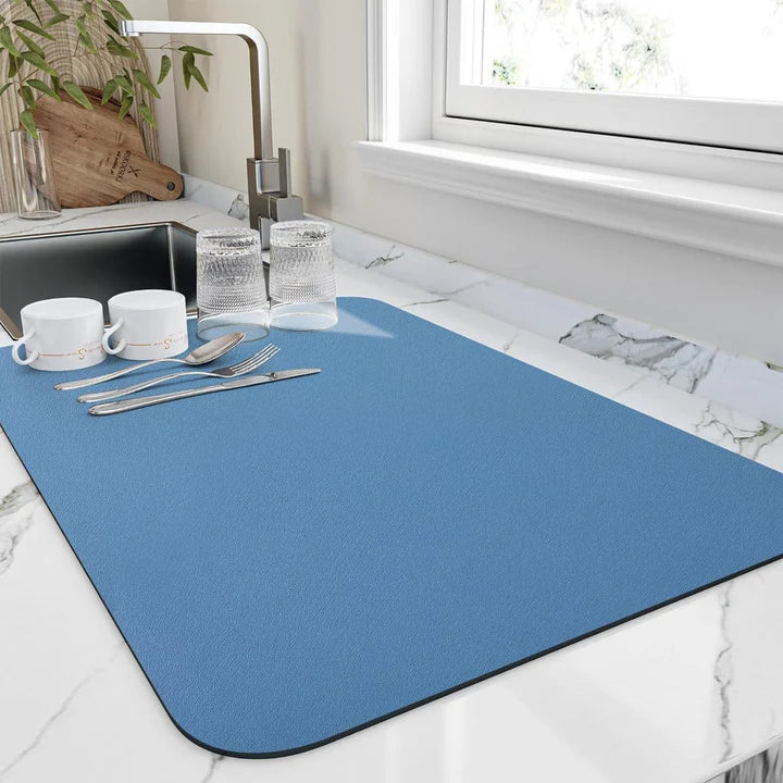 Grey quick-dry kitchen dish mat with a soft, absorbent surface, designed for efficient countertop protection.