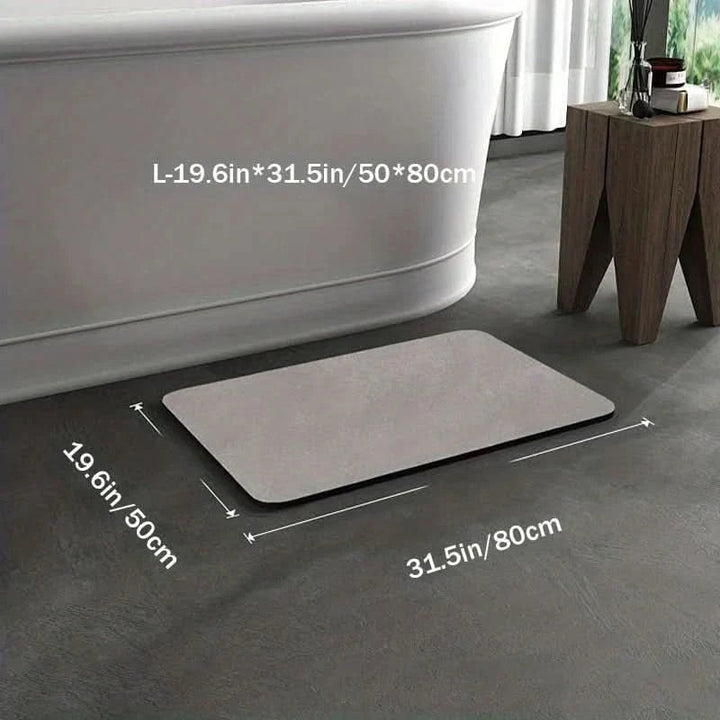 Close-up of a textured, non-slip diatomite bath mat in natural material