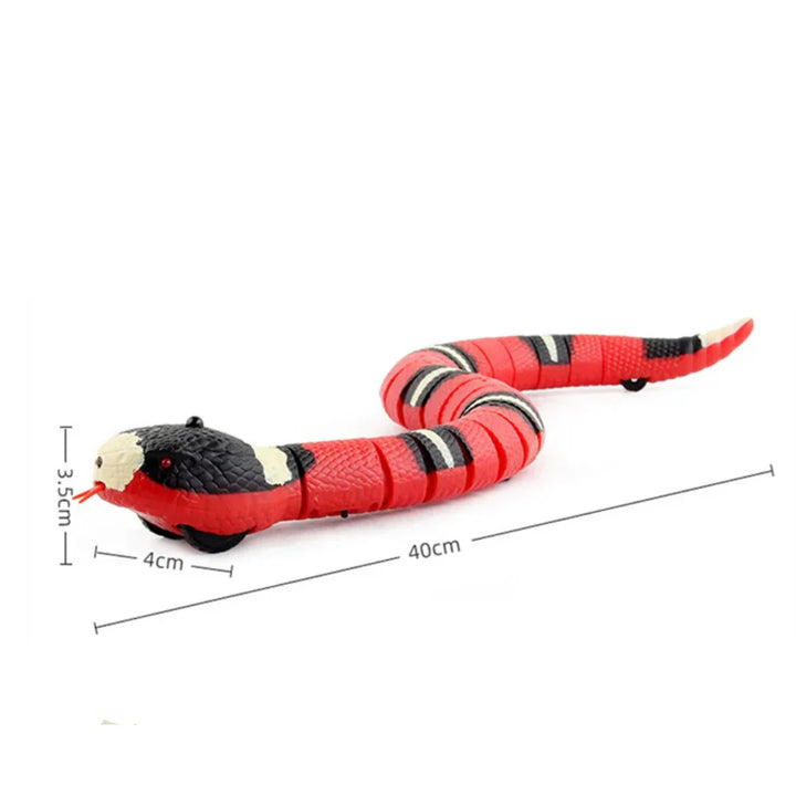 Green interactive snake cat toy moving on a floor, designed to activate feline hunting instincts & provide fun play.