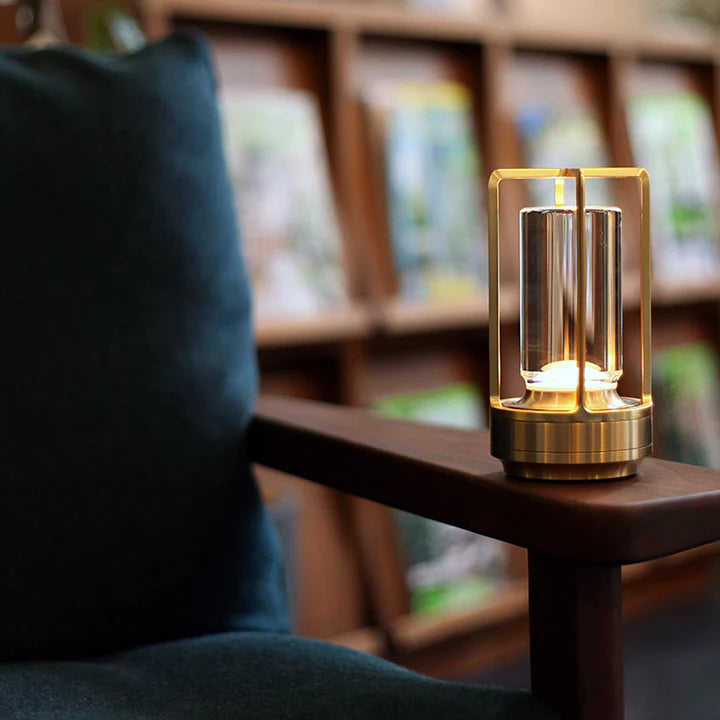 Portable rechargeable LED desk lamp, stylish modern design for a productive home office setup.