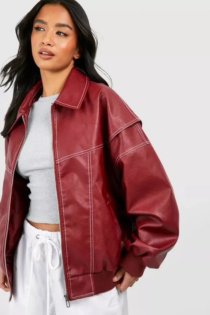 Versatile women's red quilted bomber jacket, perfect for casual layering in autumn/winter.