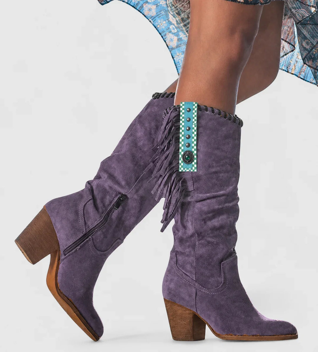 Purple ladies' orthopedic knee-high western boots, featuring a supportive design, fringe & a stable block heel.
