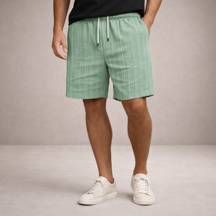 Men's relaxed fit shorts for summer, elastic waist, knee-length, perfect for active days.