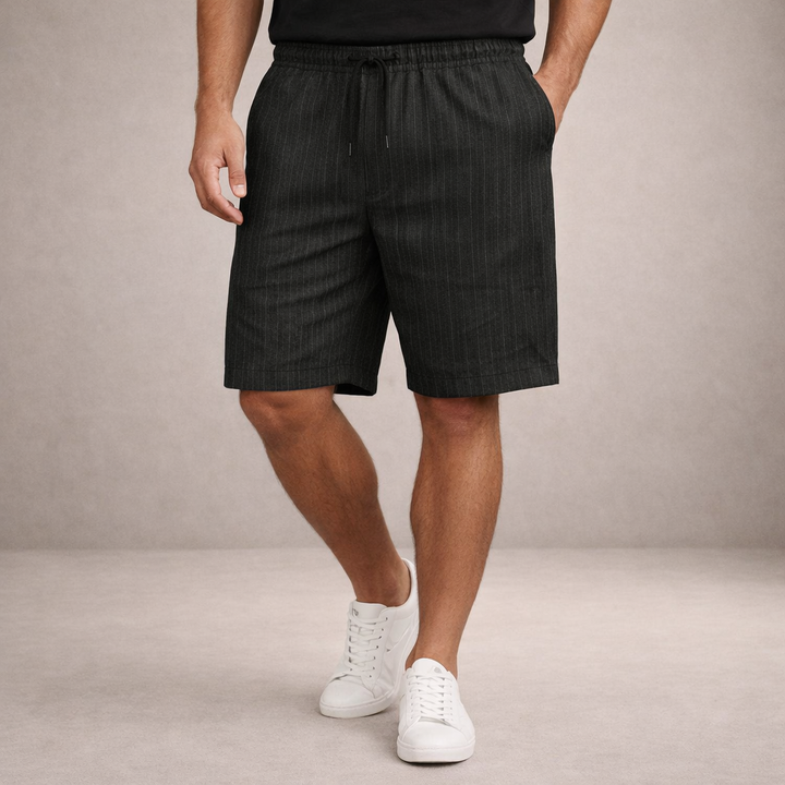 Comfortable men's knee-length shorts, relaxed fit, ideal for summer & warm weather.