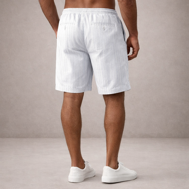 Knee-length men's summer shorts, relaxed fit, drawstring waist, ideal for warm weather.