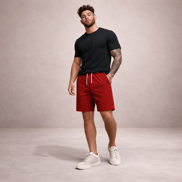 Men's knee-length relaxed fit shorts, drawstring, ideal for vacation & beachwear comfort.