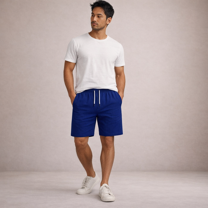 Lightweight men's summer shorts, relaxed fit, drawstring closure, versatile & comfortable.