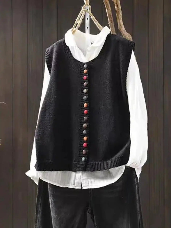 Stylish button-up knitted vest for women, a versatile sleeveless piece with relaxed fit for casual autumn layering.