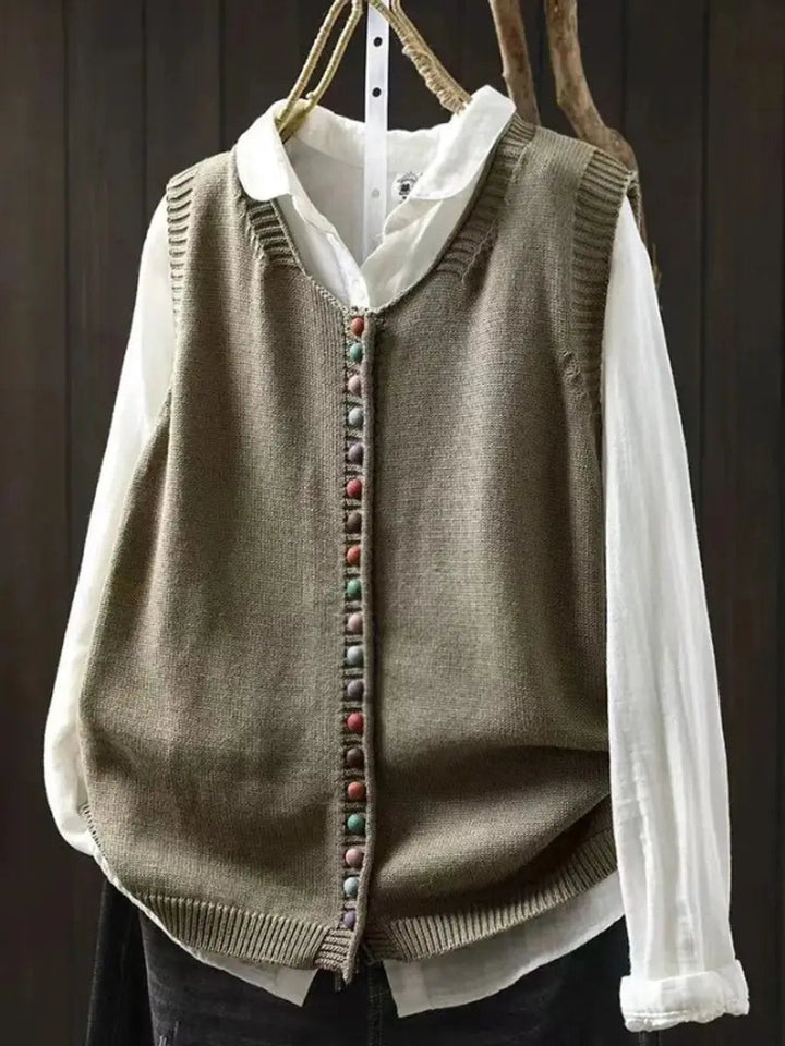 Soft, relaxed fit women's knit vest with functional button-up detail, great for everyday comfort and casual styling.