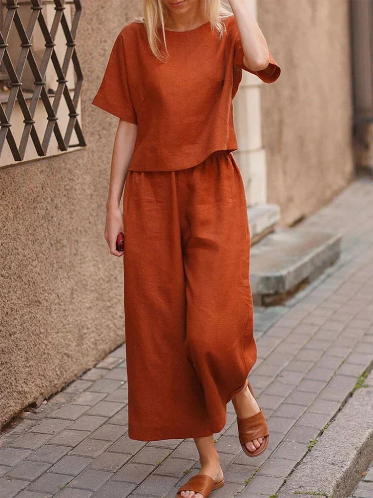 Relaxed fit women's linen two-piece set with wide-leg pants, perfect for comfortable summer loungewear.