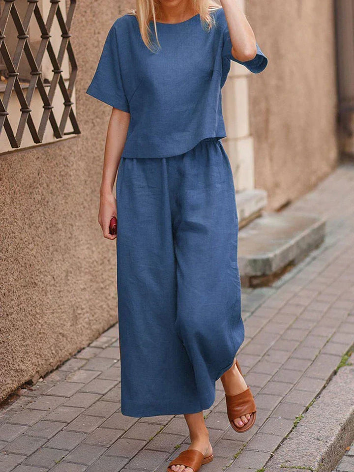 Comfortable women's relaxed fit linen two-piece set with flowy wide-leg pants, great for summer outfits.