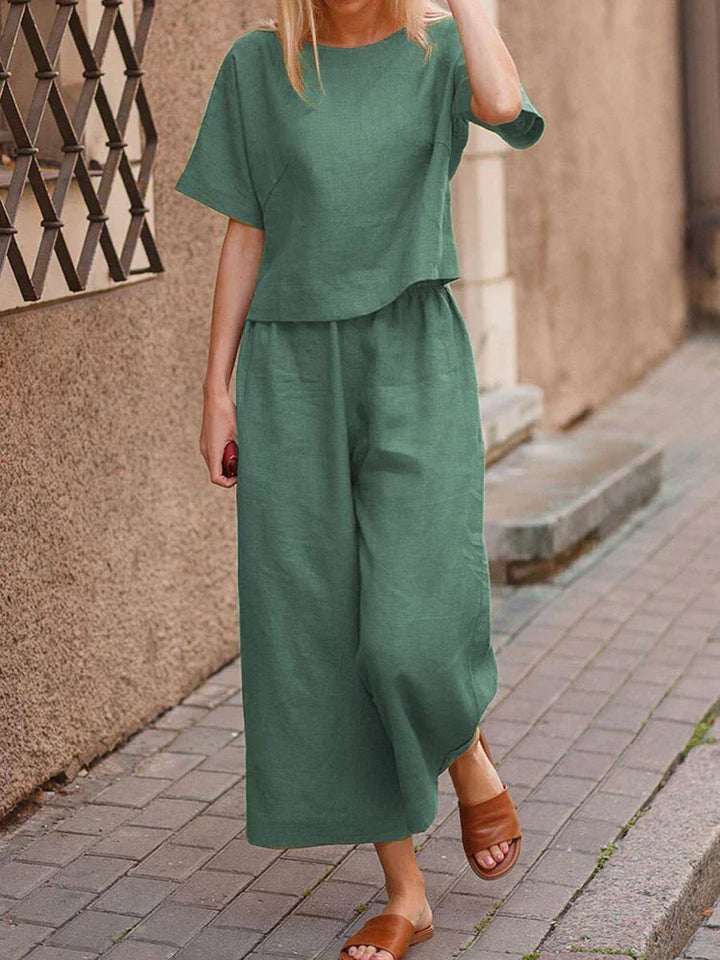 Versatile women's linen linen two-piece outfit: relaxed top & wide-leg pants for casual, breathable summer style.