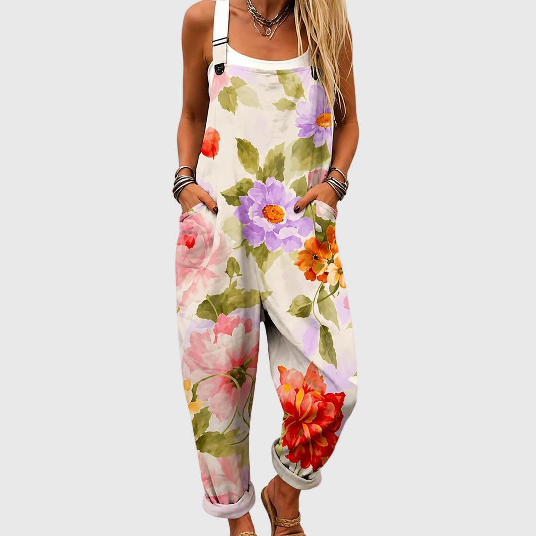 Relaxed fit women's watercolor floral overalls. Comfortable spring/summer casual wear, perfect for all sizes.