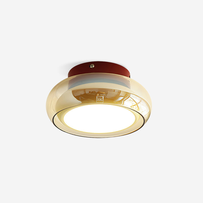 Retro flush mount ceiling light with glass shade for cozy home ambiance.