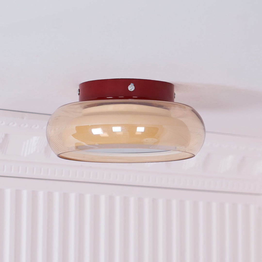 Unique retro flush mount light fixture with artistic glass elements for home decor.