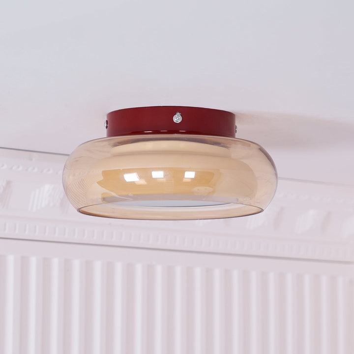 Unique retro flush mount light fixture with artistic glass elements for home decor.