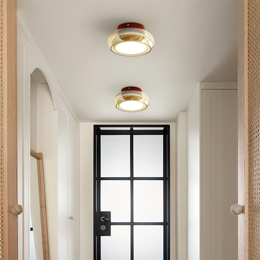 Modern retro flush mount ceiling light, providing warm LED ambient lighting.