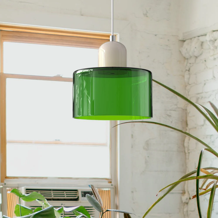 Classic glass pendant light with an adjustable cord for versatile home lighting.